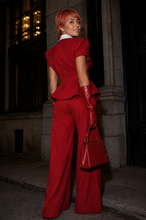 Load image into Gallery viewer, Close-up of the Scarlet Sovereign Suit showcasing structured tailoring, oversized collar, peplum silhouette, and luxury craftsmanship.