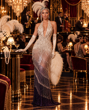 Load image into Gallery viewer, Champagne silver and midnight black Jazz Era floor-length gown with crystal embellishments, plunging halter neckline and cascading beaded fringe.