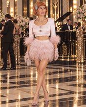 Load image into Gallery viewer, Blush pink Jazz Era-inspired two-piece set featuring a cropped jeweled jacket with feather cuffs and coordinating feather mini skirt.