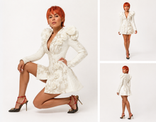 Load image into Gallery viewer, Luxury ivory blazer mini dress with sculptural floral appliqués, structured shoulders, long sleeves, and an elegant couture-inspired silhouette.
