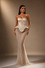Load image into Gallery viewer, Luxury pearl embellished evening gown featuring a sculpted corset bodice, couture peplum waist and elegant mermaid silhouette from Mineli's Closet Evening Dresses Collection.