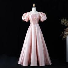 Load image into Gallery viewer, pink Regency-inspired formal gown with dramatic puff sleeves, blush floral embroidery, fitted waist and full A-line skirt.