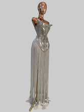 Load image into Gallery viewer, Silver Jazz Era gown featuring a structured crystal-embellished bodice with Art Deco geometric detailing and dramatic floor-length silver fringe.