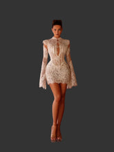 Load image into Gallery viewer, Ivory lace mini dress featuring a structured illusion corset bodice, cascading pearl embellishments, high neckline and dramatic long bell sleeves.
