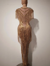 Load image into Gallery viewer, Golden Gatsby Art Deco Fringe Gown featuring cascading gold fringe, geometric embellishments and nude illusion detailing from the Global Couture Jazz Era Collection.