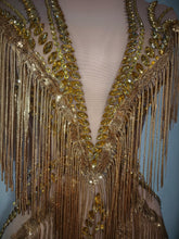 Load image into Gallery viewer, Golden Gatsby Art Deco Fringe Gown featuring cascading gold fringe, geometric embellishments and nude illusion detailing from the Global Couture Jazz Era Collection.