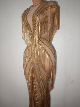 Load image into Gallery viewer, Golden Gatsby Art Deco Fringe Gown featuring cascading gold fringe, geometric embellishments and nude illusion detailing from the Global Couture Jazz Era Collection.