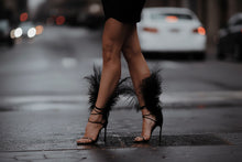 Load image into Gallery viewer, Black Midnight Plume Sandals featuring elegant lace-up straps, dramatic feather ankle accents, open square toes, and slim stiletto heels, styled for luxury resort wear and editorial fashion.