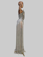 Load image into Gallery viewer, Silver Jazz Era gown featuring a structured crystal-embellished bodice with Art Deco geometric detailing and dramatic floor-length silver fringe.